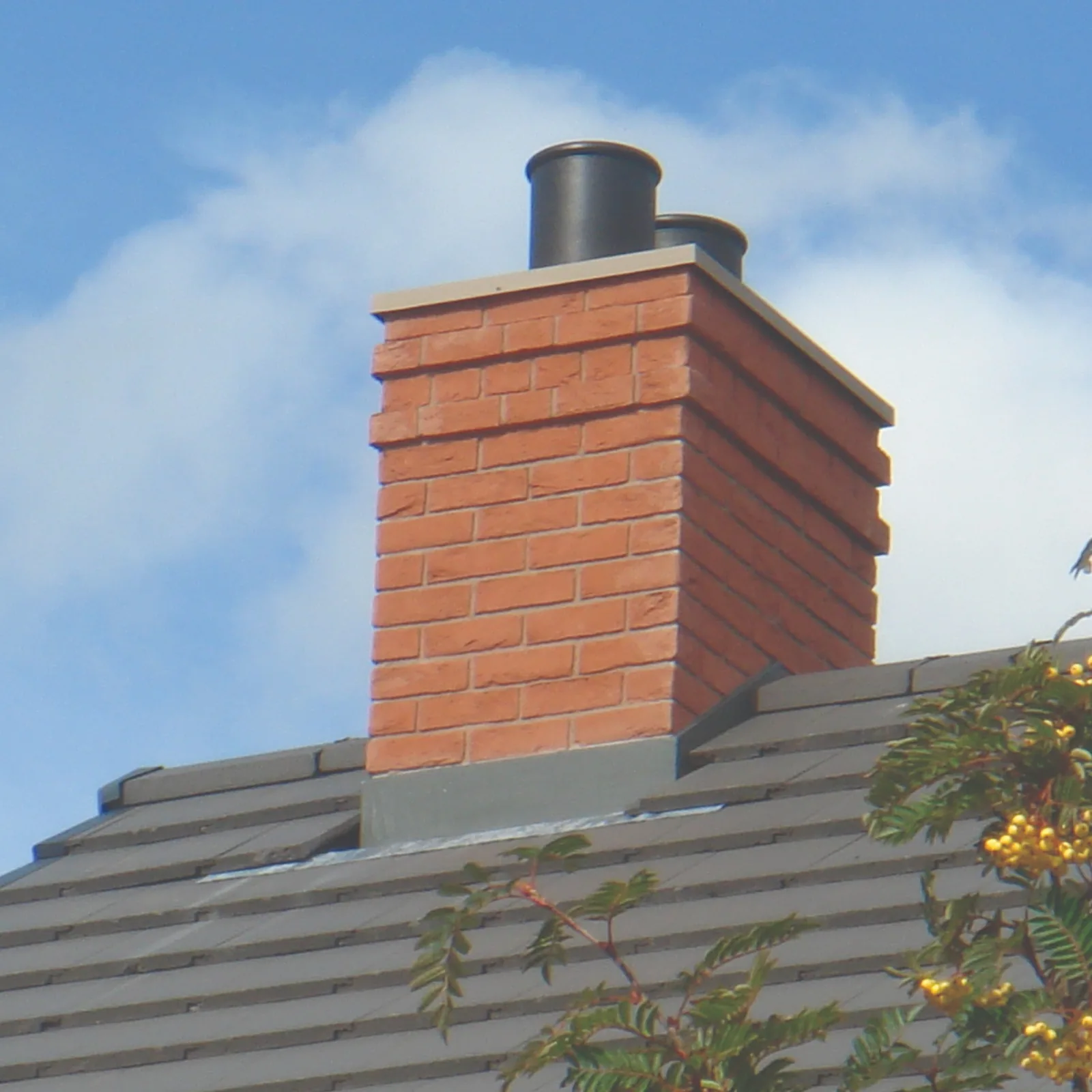 A chimney removal and roof repair